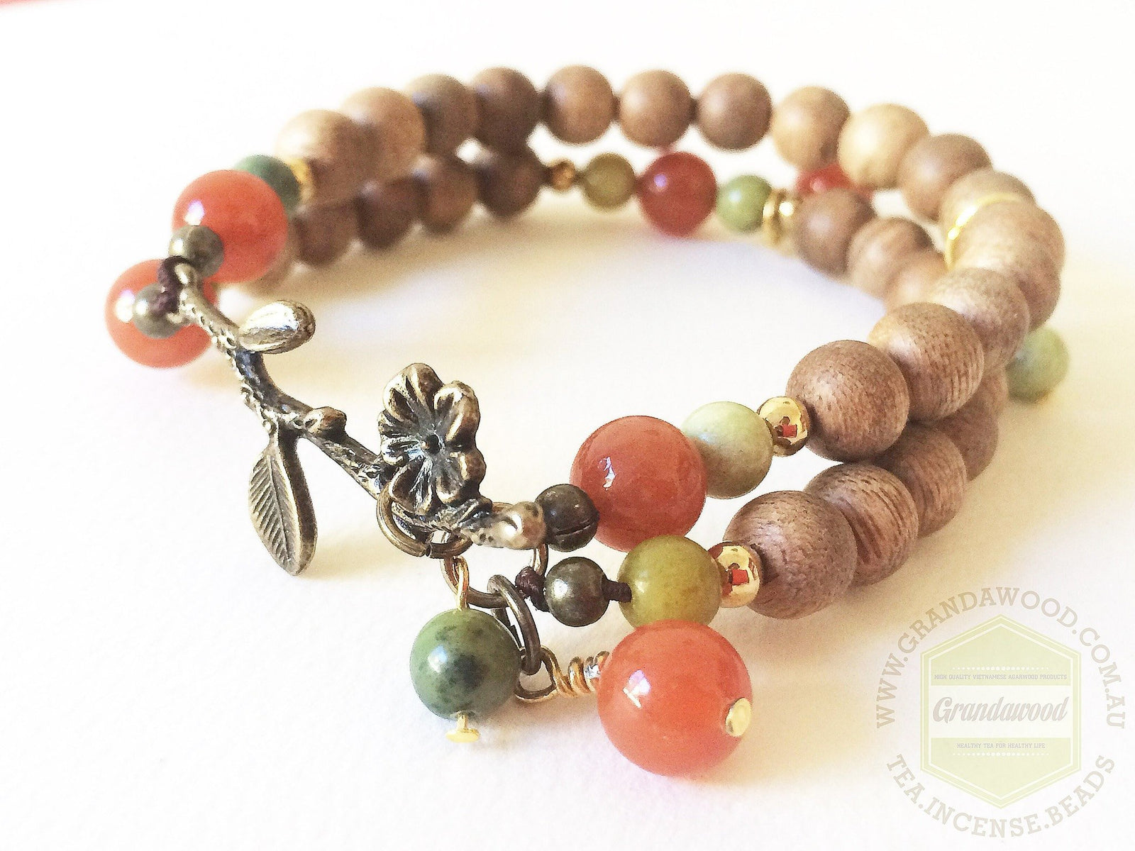 Agarwood lucky charm with red aventurine and grass turquoise bringing fortune and wealth -