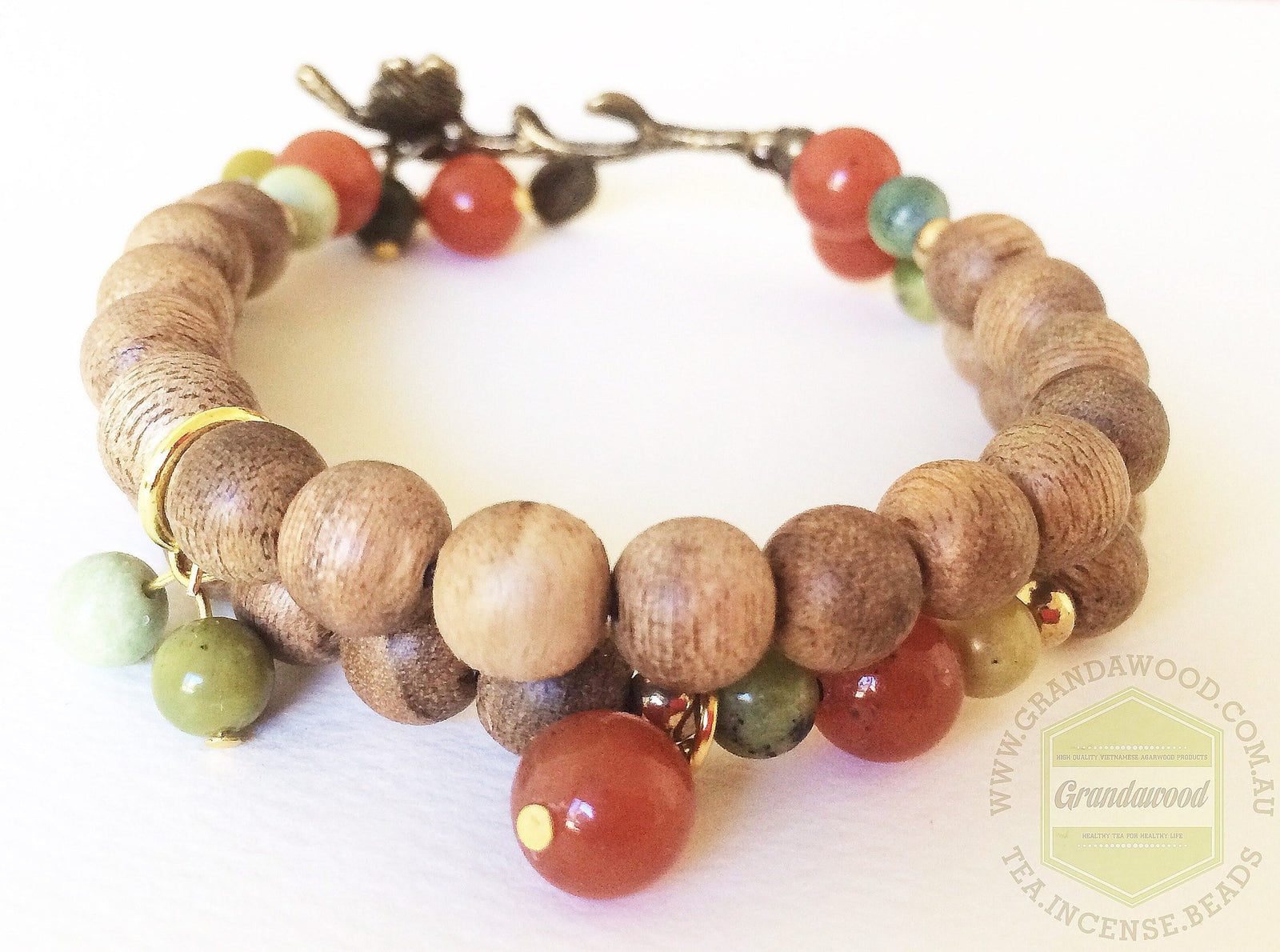 Agarwood lucky charm with red aventurine and grass turquoise bringing fortune and wealth -