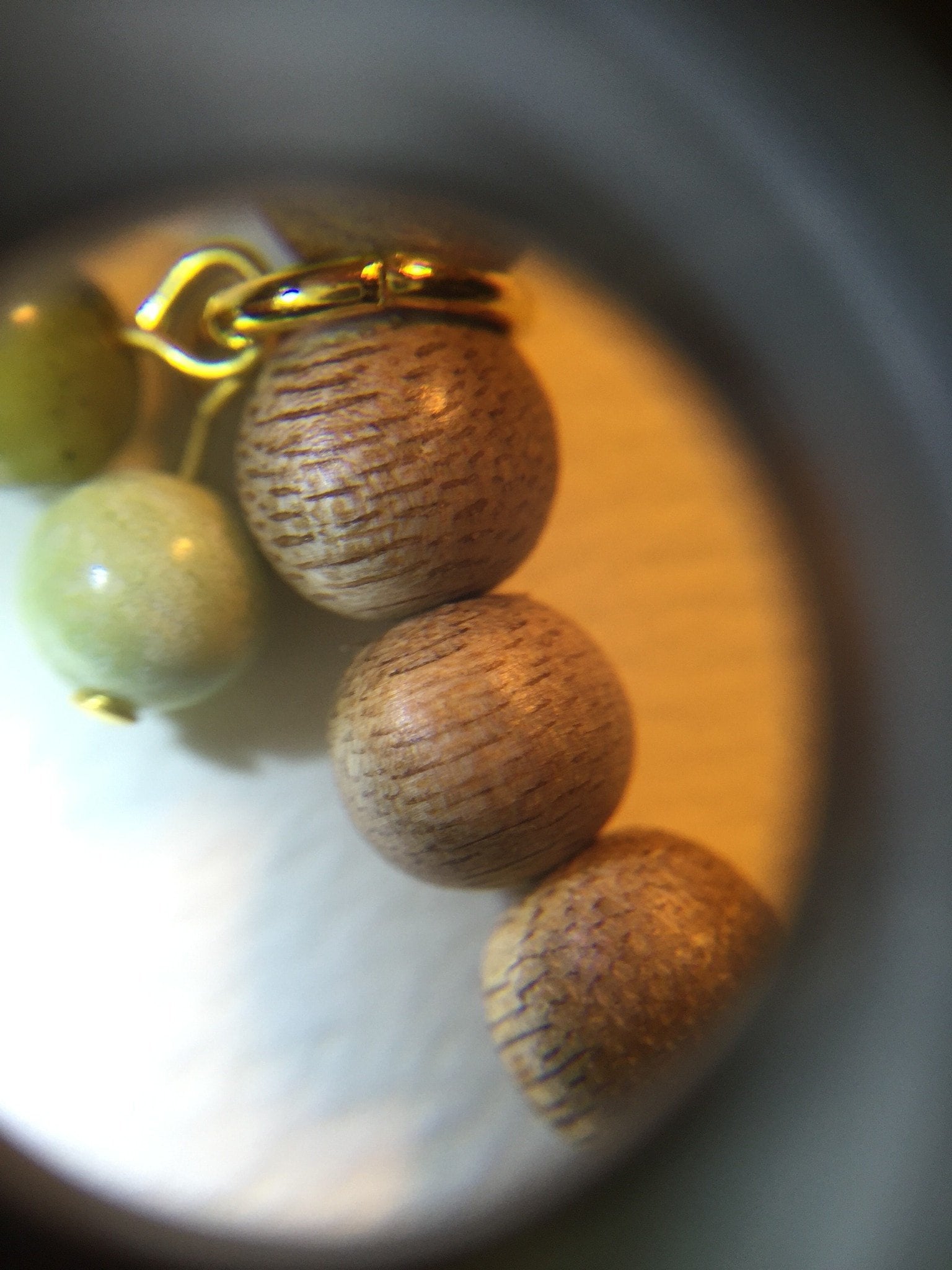 Agarwood lucky charm with red aventurine and grass turquoise bringing fortune and wealth -