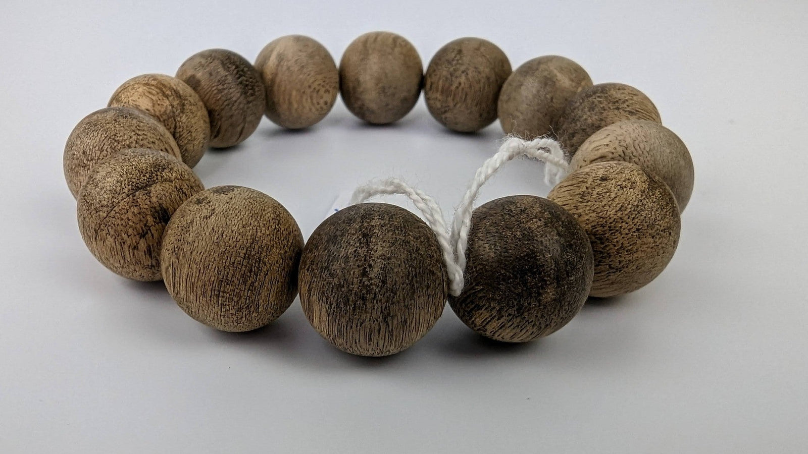 Beads WMB  Wild Merauke Agarwood bracelet 21 g light-polished 14 beads 16mm