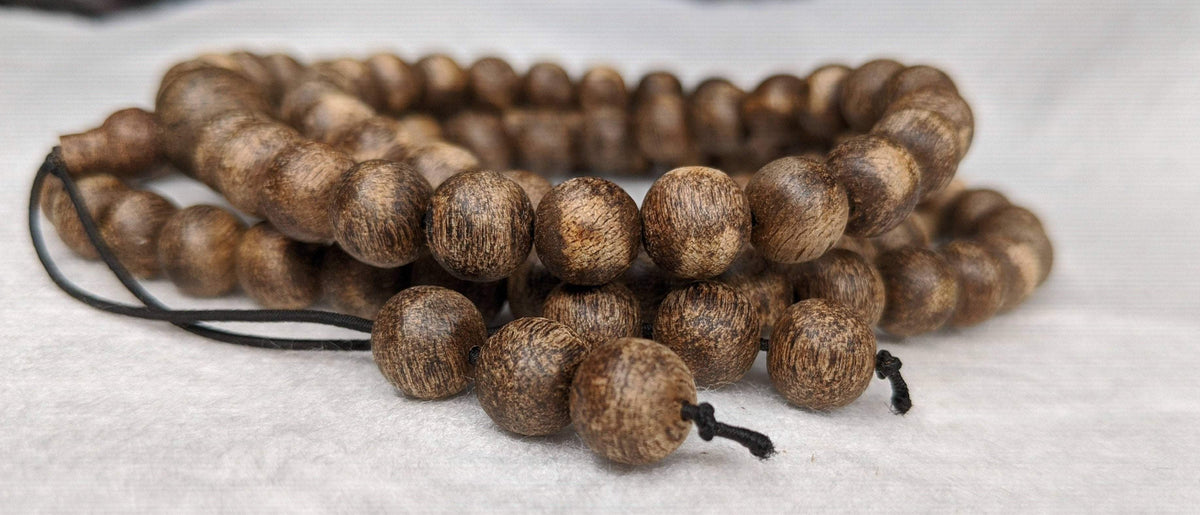 The Wiseman , Wisdom From The Elders, 108 mala made from Wild Agarwood from a small village -