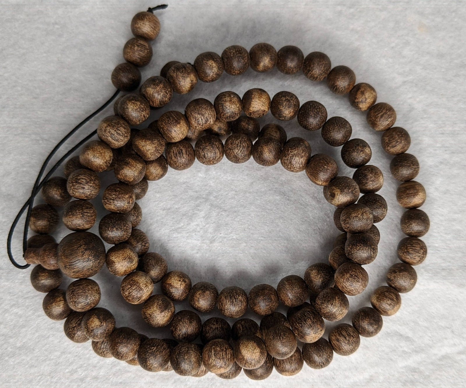 The Wiseman , Wisdom From The Elders, 108 mala made from Wild Agarwood from a small village -