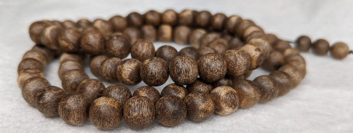 The Wiseman , Wisdom From The Elders, 108 mala made from Wild Agarwood from a small village -