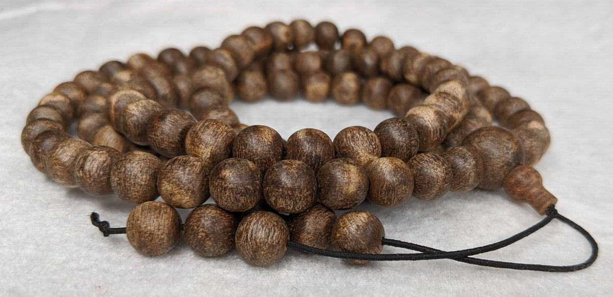The Wiseman , Wisdom From The Elders, 108 mala made from Wild Agarwood from a small village -