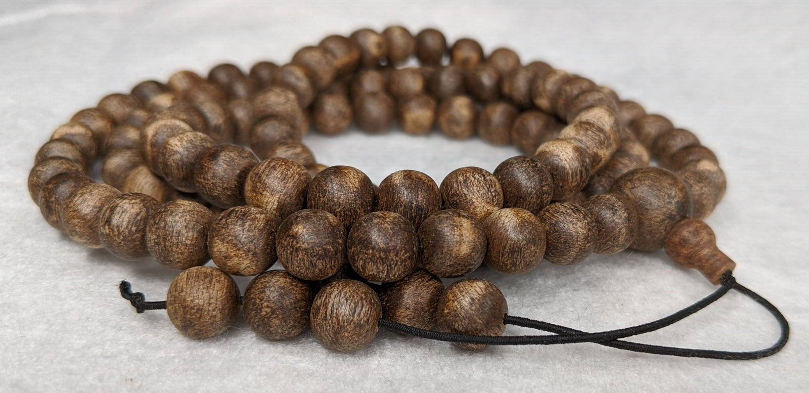 The Wiseman , Wisdom From The Elders, 108 mala made from Wild Agarwood from a small village -