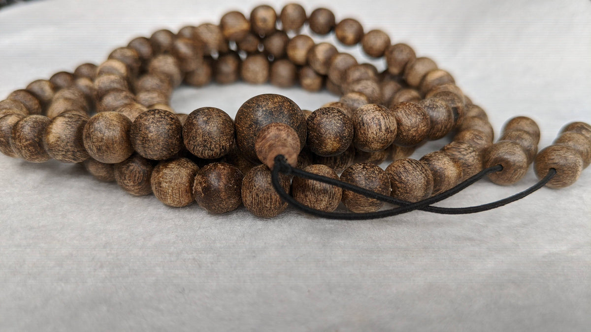 The Wiseman , Wisdom From The Elders, 108 mala made from Wild Agarwood from a small village -