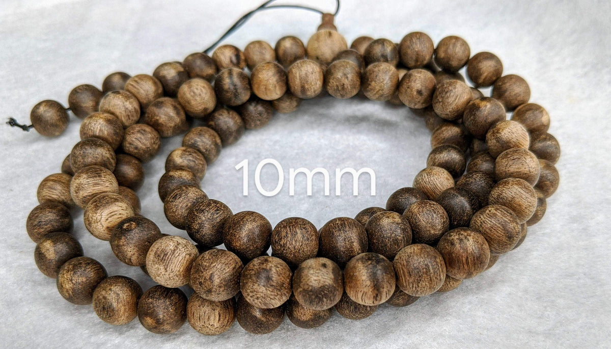 The Wiseman , Wisdom From The Elders, 108 mala made from Wild Agarwood from a small village -