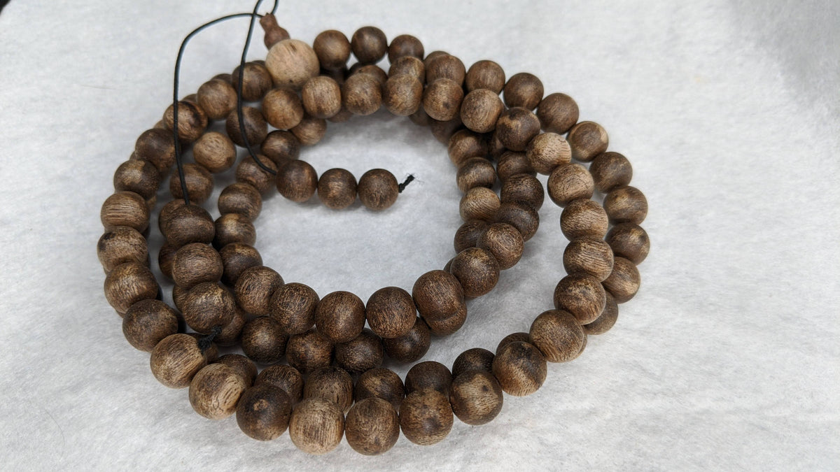 The Wiseman , Wisdom From The Elders, 108 mala made from Wild Agarwood from a small village -