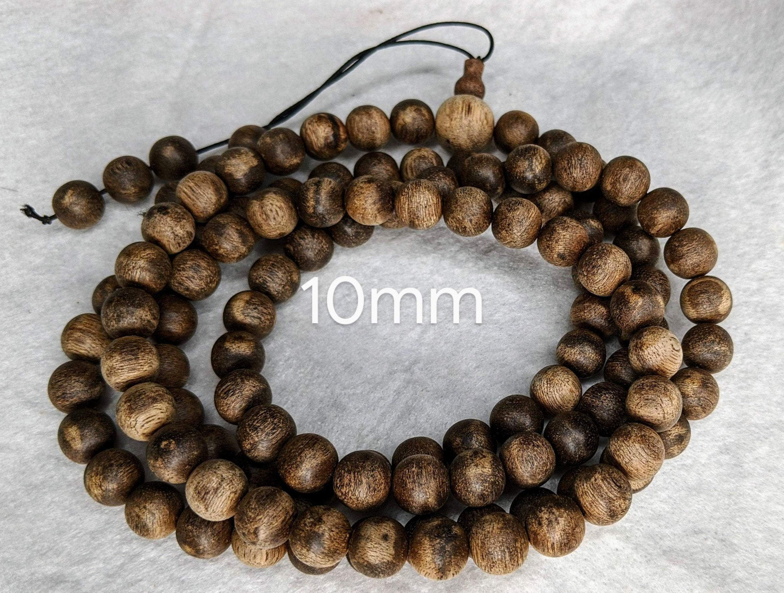 The Wiseman , Wisdom From The Elders, 108 mala made from Wild Agarwood from a small village -