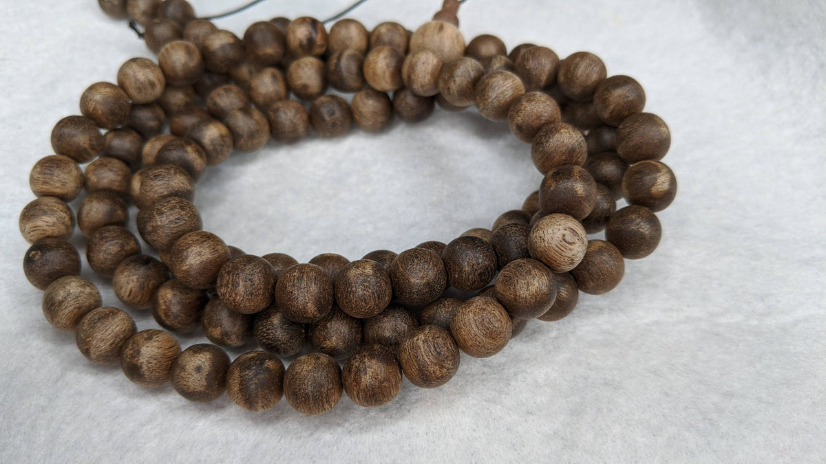 The Wiseman , Wisdom From The Elders, 108 mala made from Wild Agarwood from a small village -