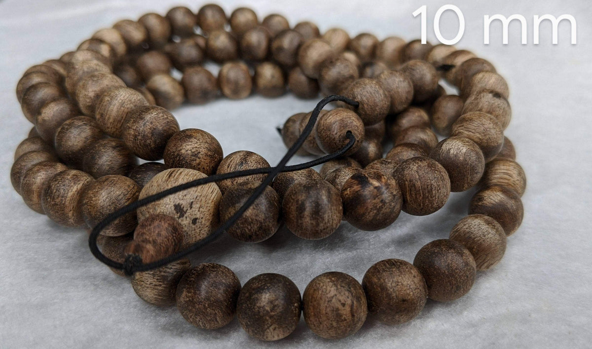 The Wiseman , Wisdom From The Elders, 108 mala made from Wild Agarwood from a small village -