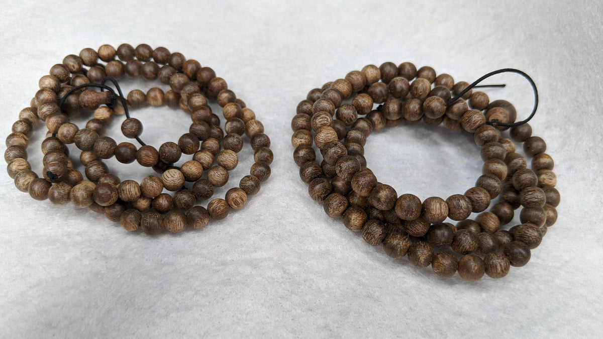 The Wiseman , Wisdom From The Elders, 108 mala made from Wild Agarwood from a small village -
