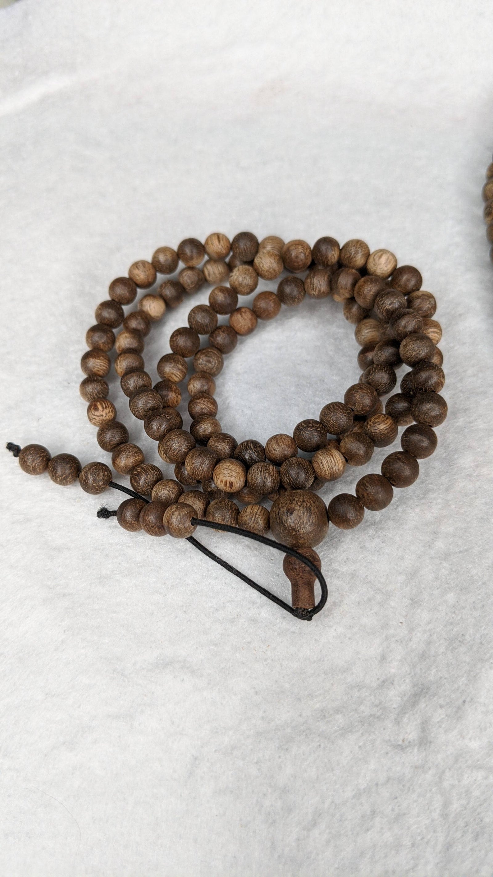 The Wiseman , Wisdom From The Elders, 108 mala made from Wild Agarwood from a small village -