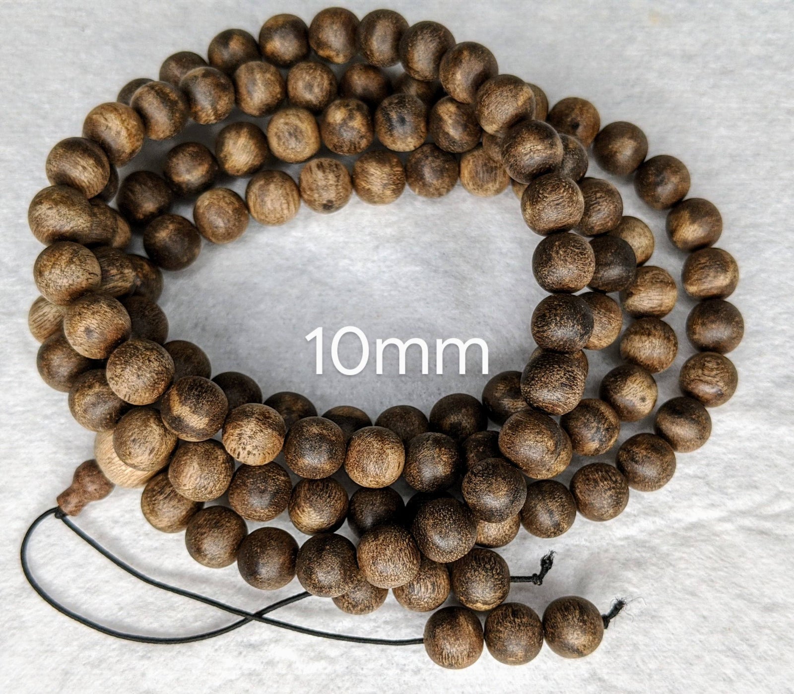 The Wiseman , Wisdom From The Elders, 108 mala made from Wild Agarwood from a small village -