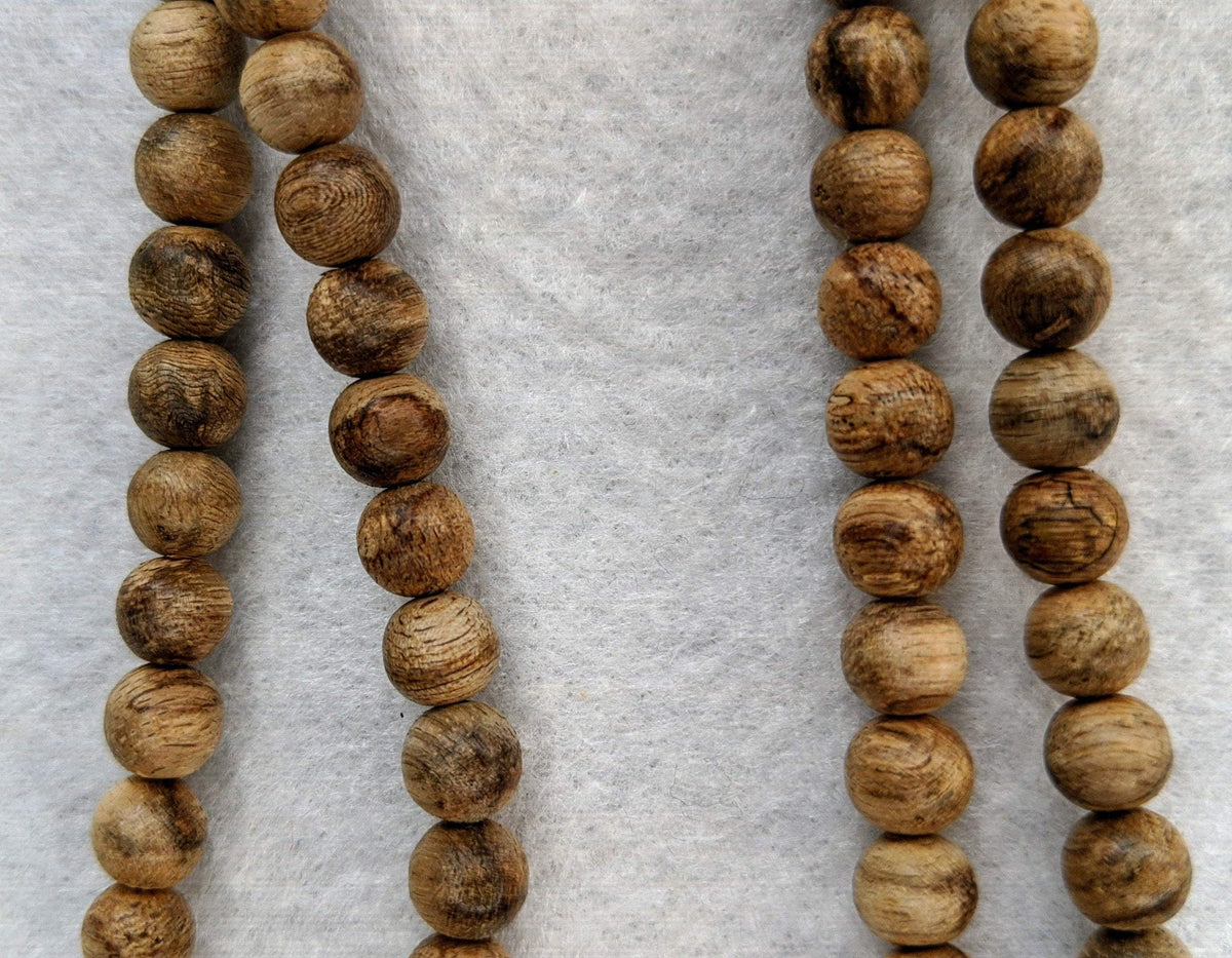 The Young Tiger Wood 108 mala Wild Boreo Agarwood 6mm 10g -