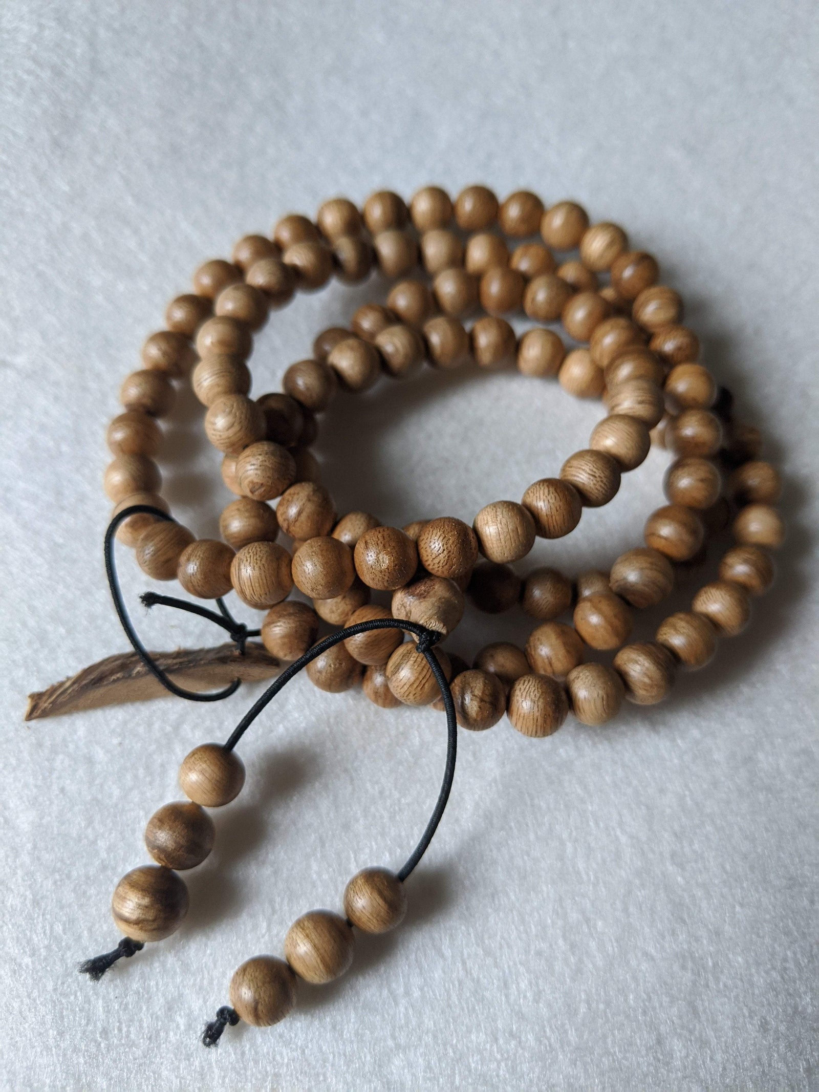 SOLD- 12.5 g, 8mm, Wild Borneo Agarwood 108 mala with a large piece of remaining material -
