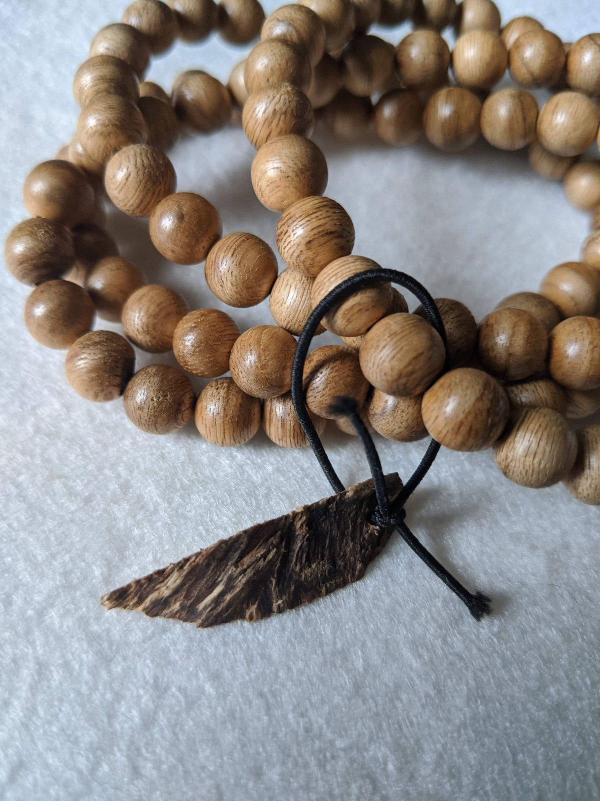 SOLD- 12.5 g, 8mm, Wild Borneo Agarwood 108 mala with a large piece of remaining material -