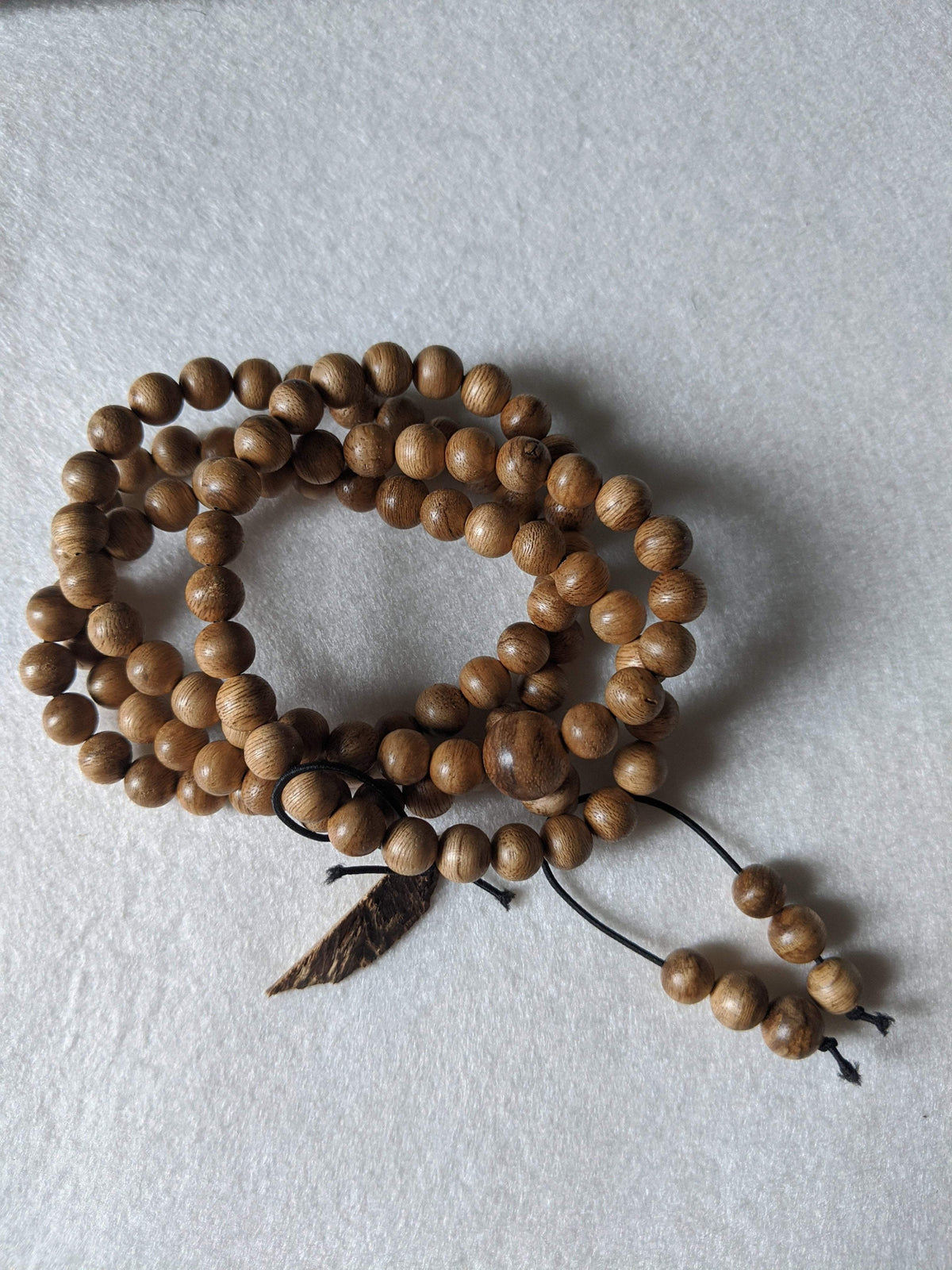 SOLD- 12.5 g, 8mm, Wild Borneo Agarwood 108 mala with a large piece of remaining material -