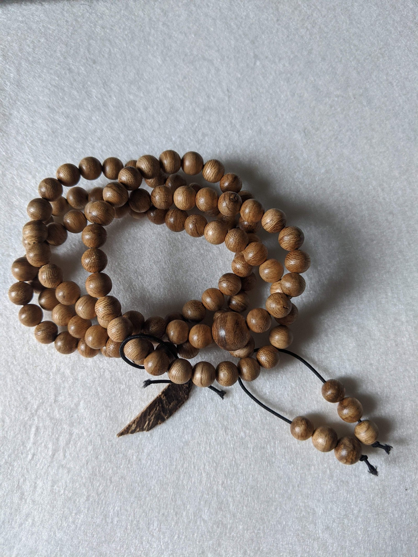 SOLD- 12.5 g, 8mm, Wild Borneo Agarwood 108 mala with a large piece of remaining material -