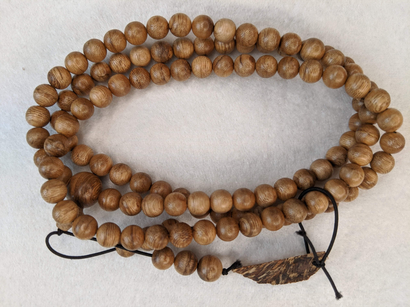 SOLD- 12.5 g, 8mm, Wild Borneo Agarwood 108 mala with a large piece of remaining material -