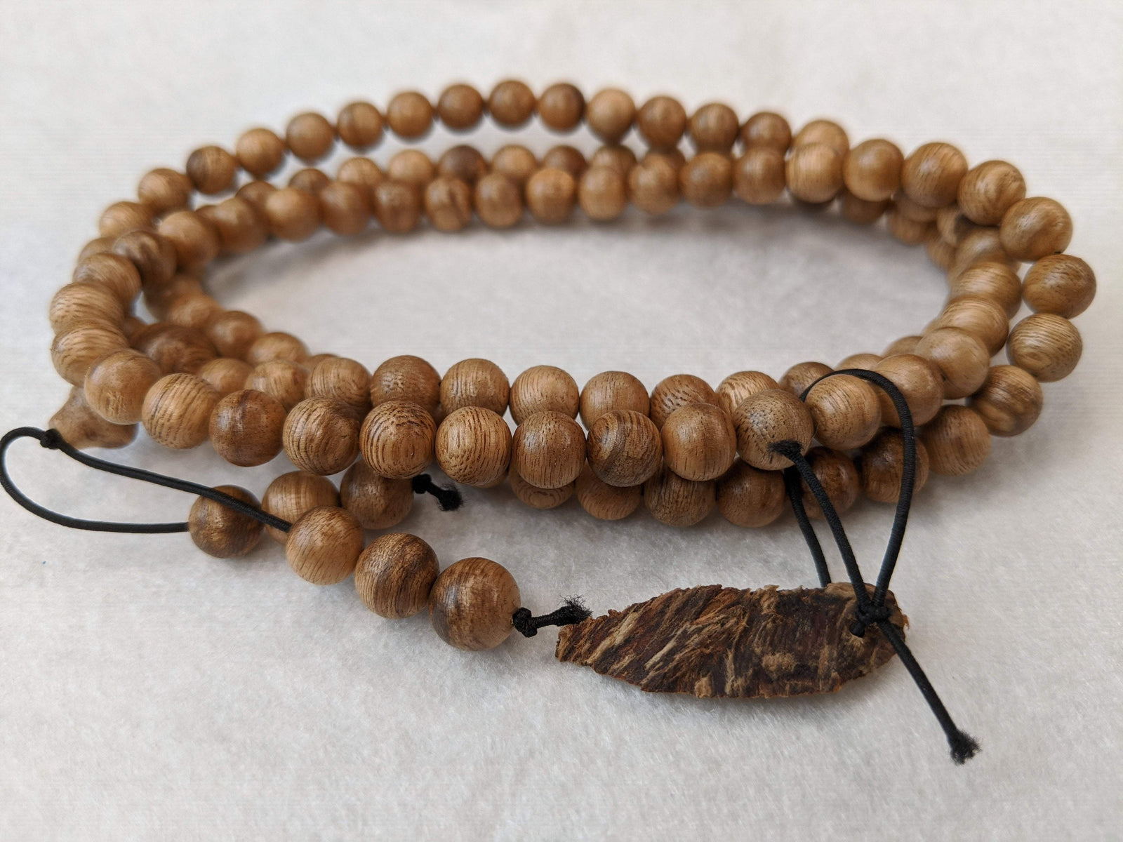 SOLD- 12.5 g, 8mm, Wild Borneo Agarwood 108 mala with a large piece of remaining material -