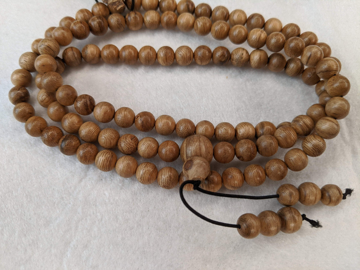 SOLD- 12.5 g, 8mm, Wild Borneo Agarwood 108 mala with a large piece of remaining material -