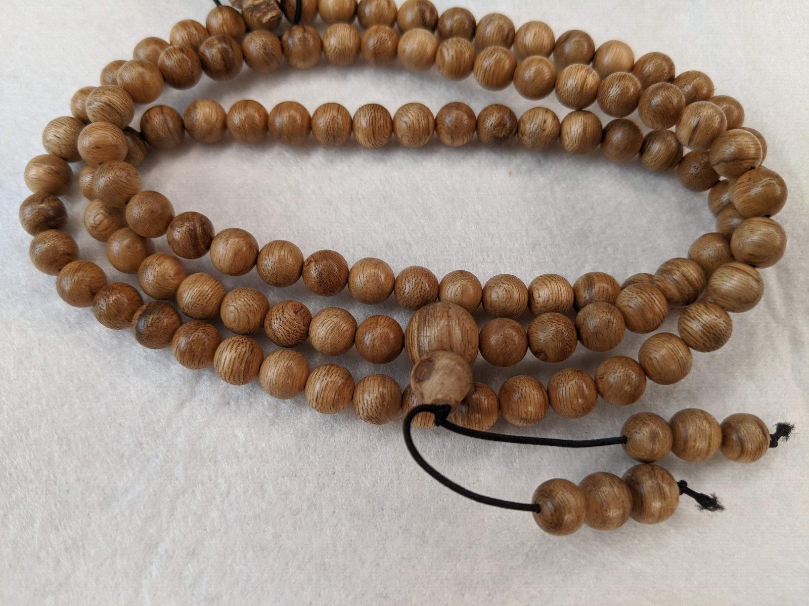 SOLD- 12.5 g, 8mm, Wild Borneo Agarwood 108 mala with a large piece of remaining material -