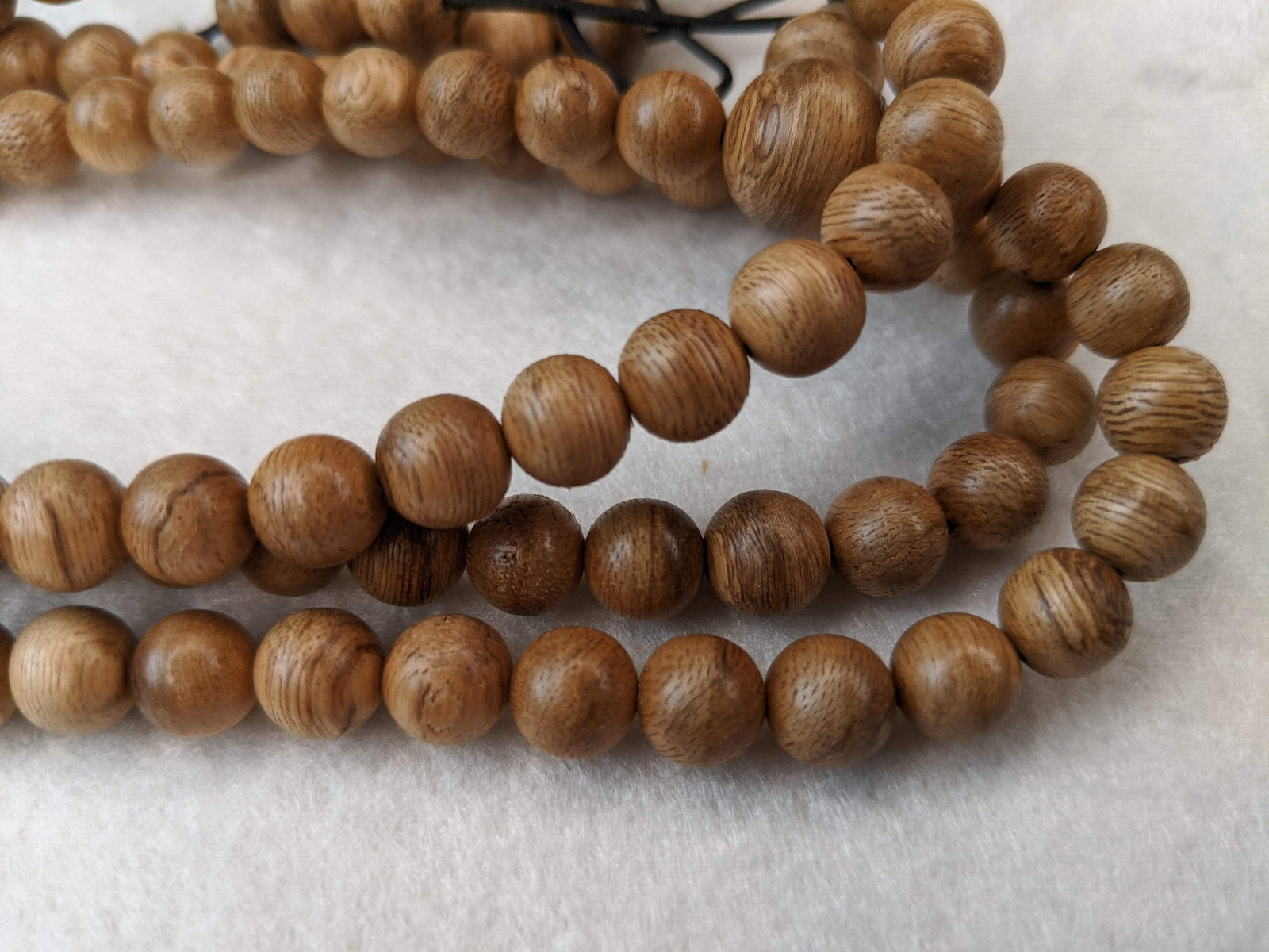 SOLD- 12.5 g, 8mm, Wild Borneo Agarwood 108 mala with a large piece of remaining material -