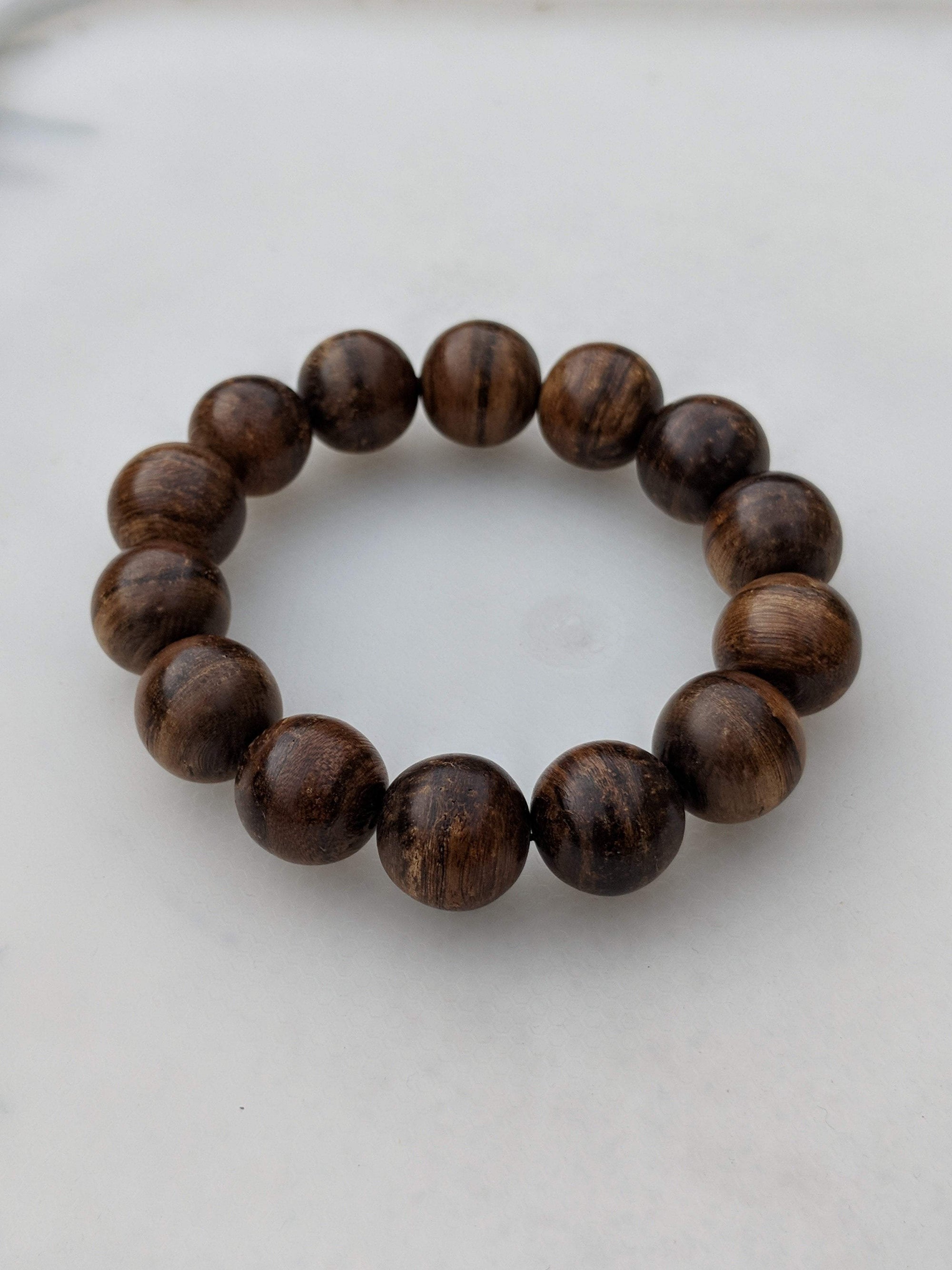 Sold Wild Agarwood Bracelet Borneo 24g sandpaper polished 14 beads 16mm -