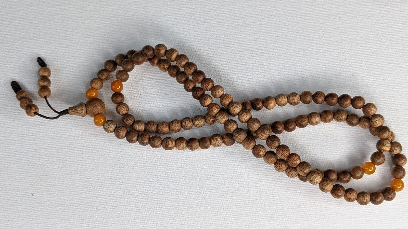 The Mood Improver - 108 Cultivated Agarwood mala with Baltic Ambers -