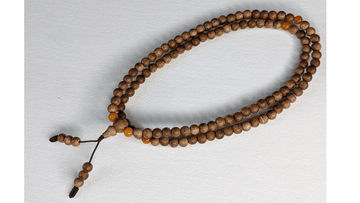The Mood Improver - 108 Cultivated Agarwood mala with Baltic Ambers -