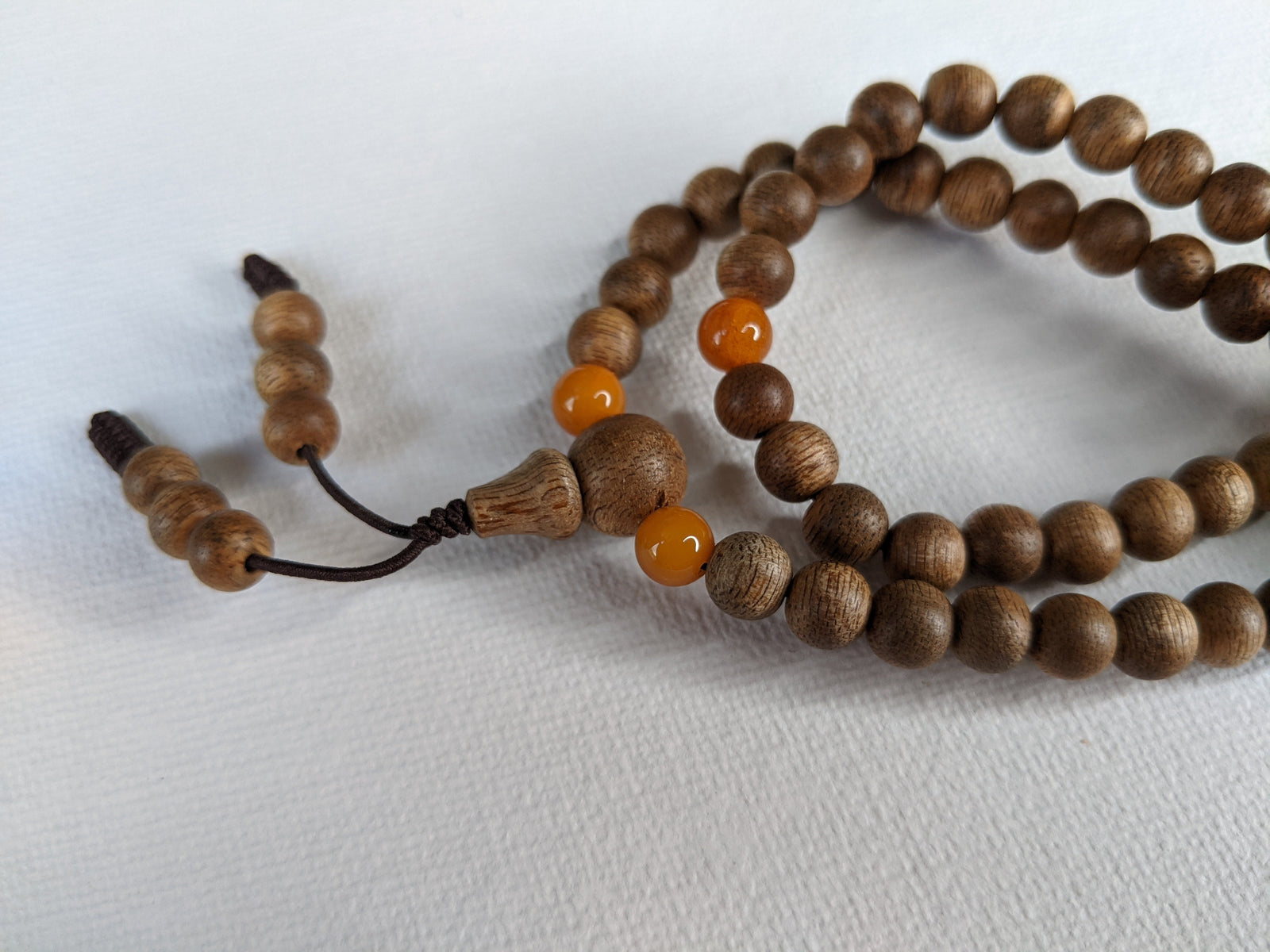 The Mood Improver - 108 Cultivated Agarwood mala with Baltic Ambers -
