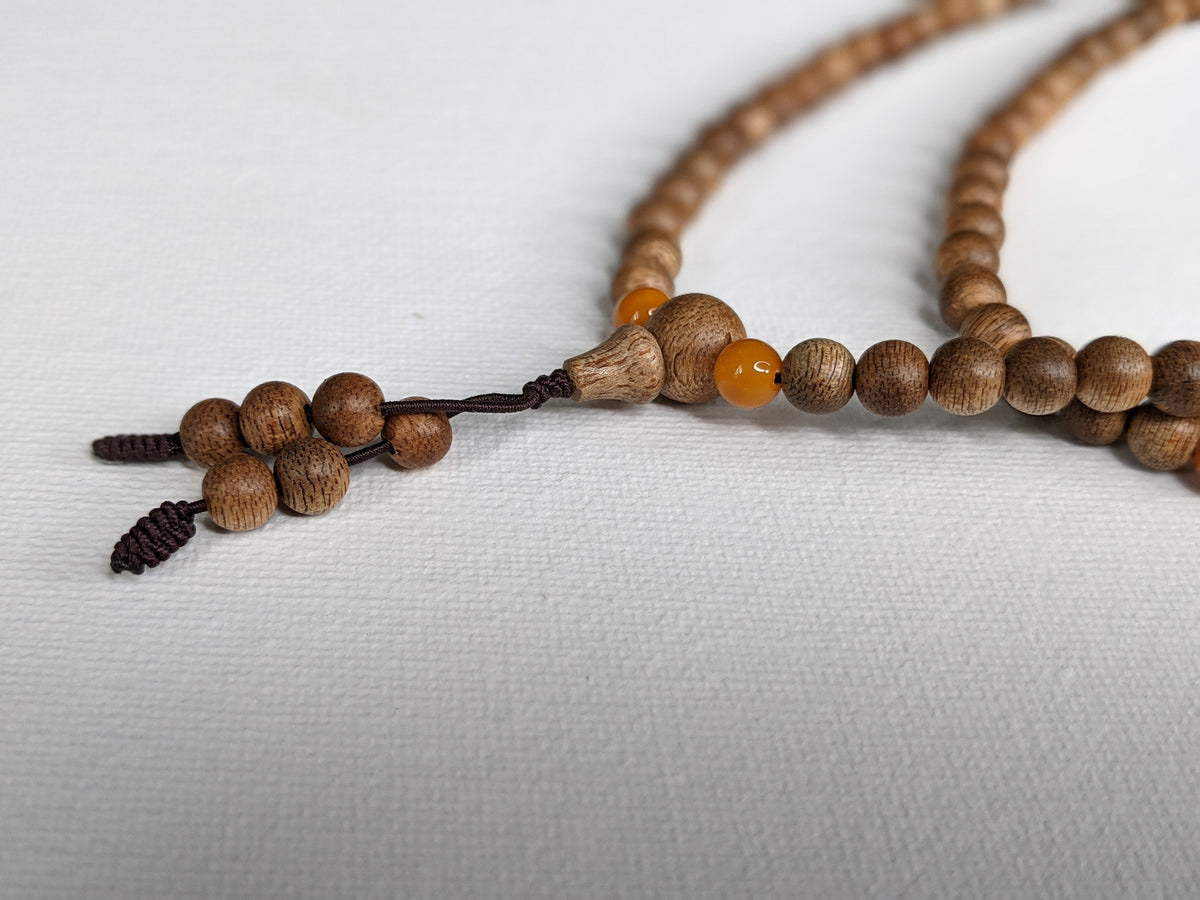 The Mood Improver - 108 Cultivated Agarwood mala with Baltic Ambers -