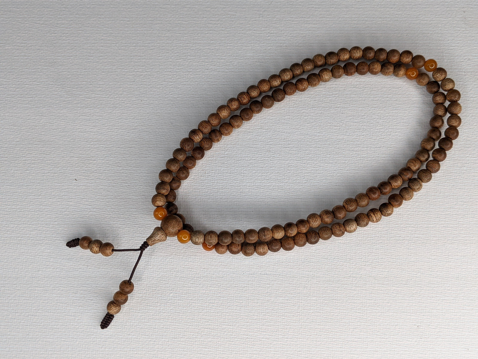 The Mood Improver - 108 Cultivated Agarwood mala with Baltic Ambers -