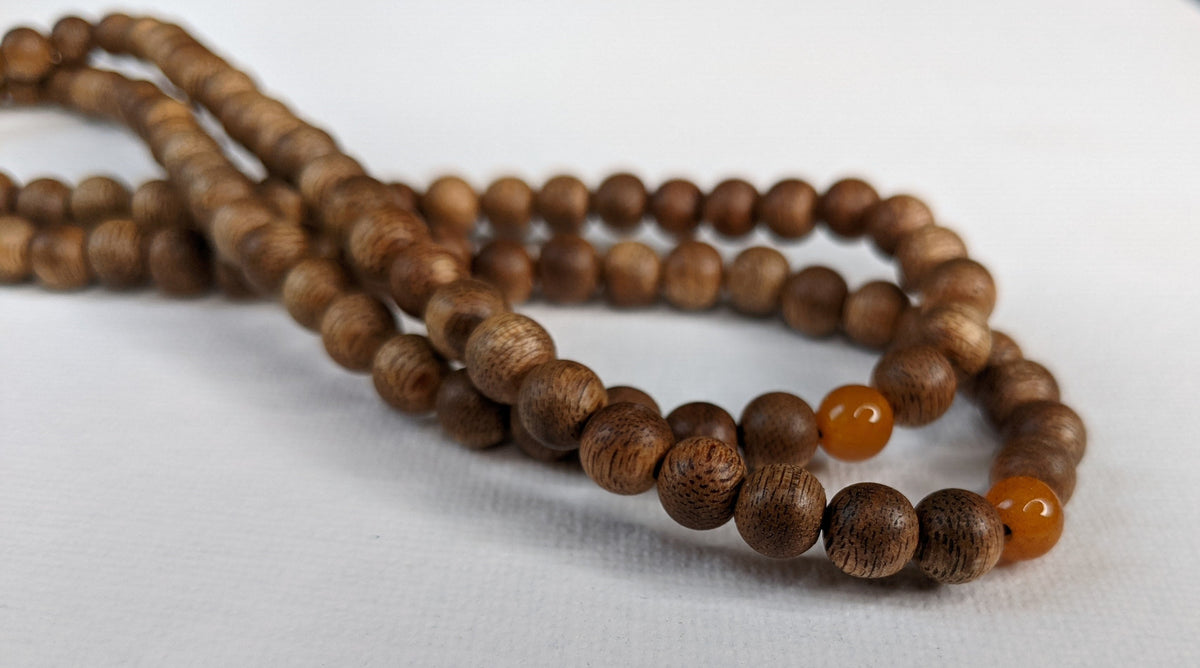 The Mood Improver - 108 Cultivated Agarwood mala with Baltic Ambers -